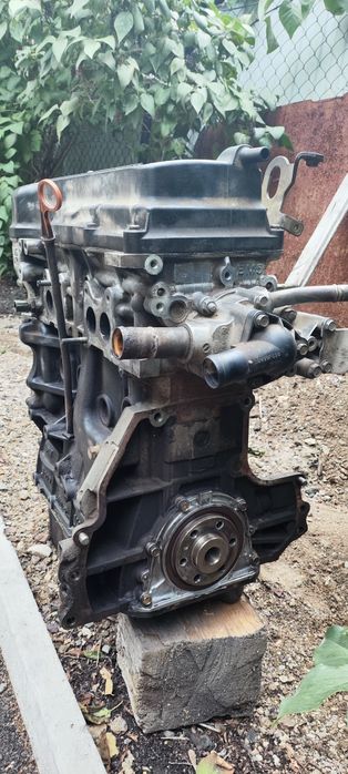 Двигатель QG15DE