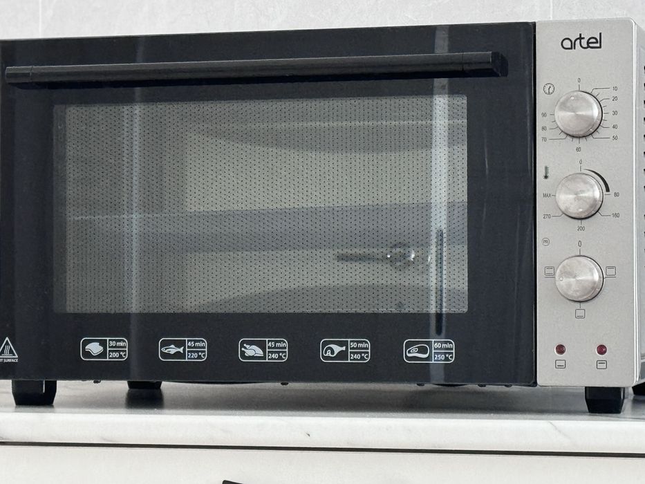 Продам настольную электропечь Artel