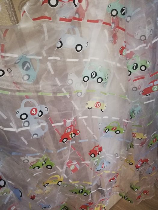 Тюль с детским принтом готовая.