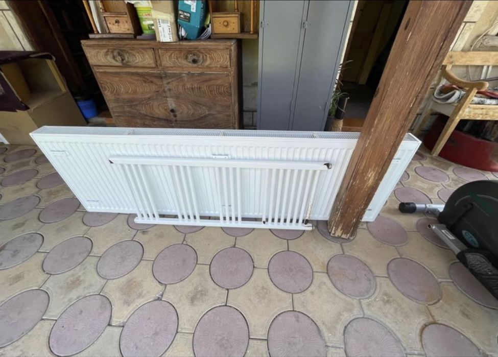 Котел с радиатори на пилети и дърва