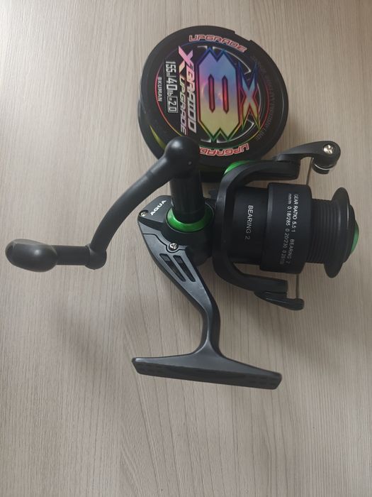 Продаю новый катушку и леску