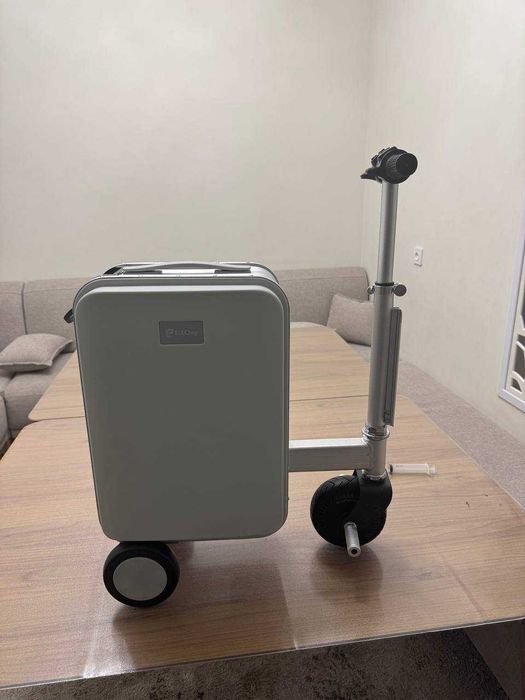 Электрический чемодан-самокат — складной