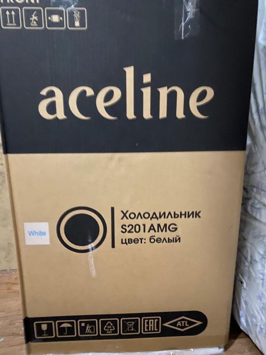 Холодильник в упаковке