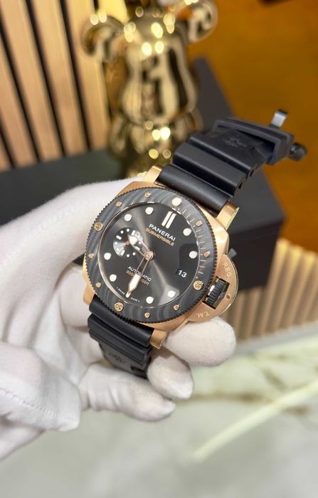panerai luminor submersible gold/black