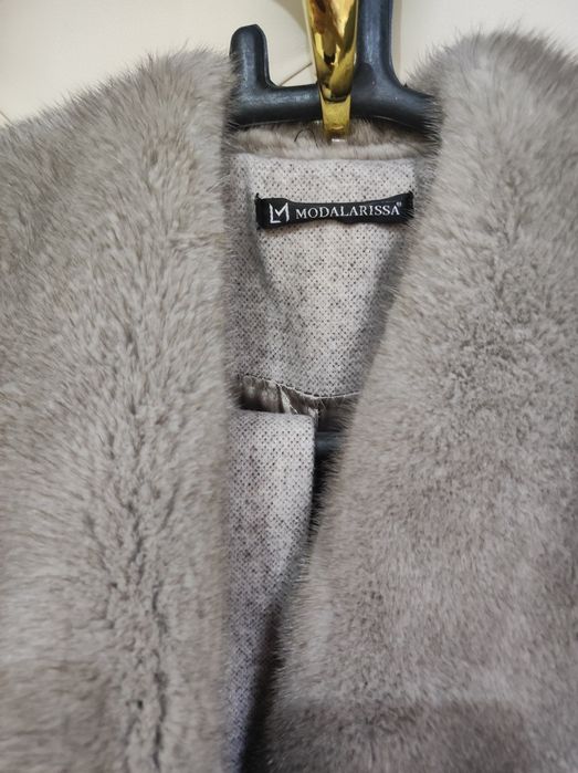 Пальто modalarissa