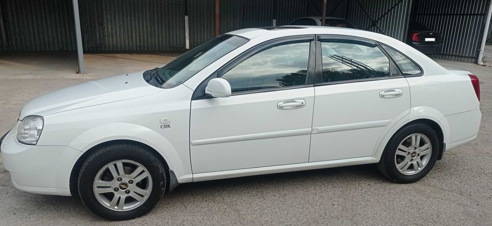 Lacetti, 1.8, АКПП, белого цвета, 2011 год, первые руки