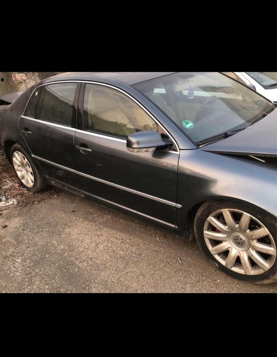 VW Phaeton,usi,navigatie,planse de bord,capota,faruri,