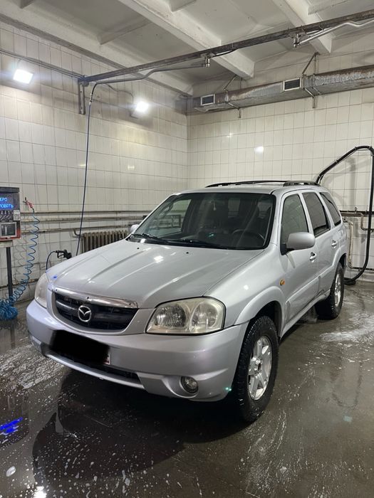 Продам Mazda Tribure