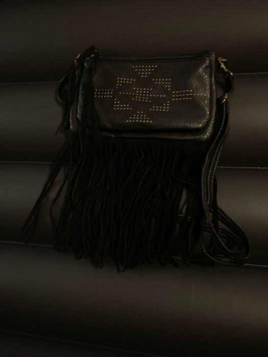 Кожаная сумочка в стиле бохо