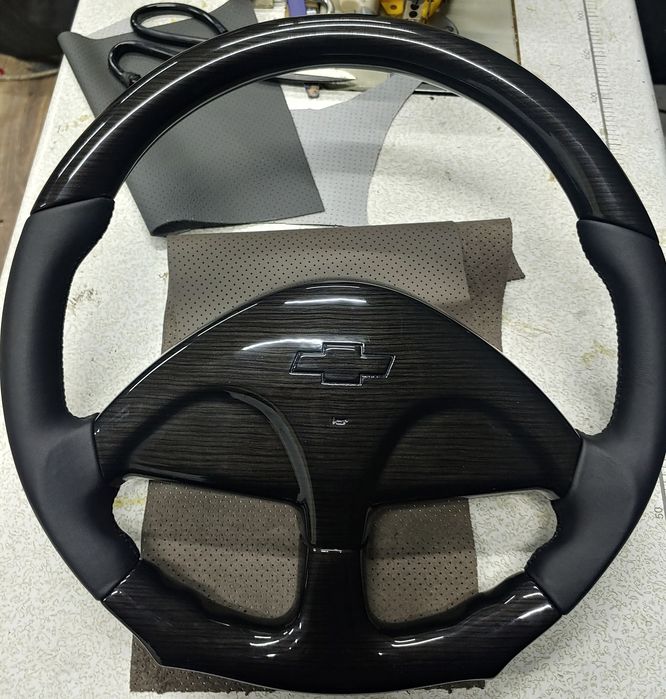 Услуги автотюнинга руль , чехлы, потолок, общивки