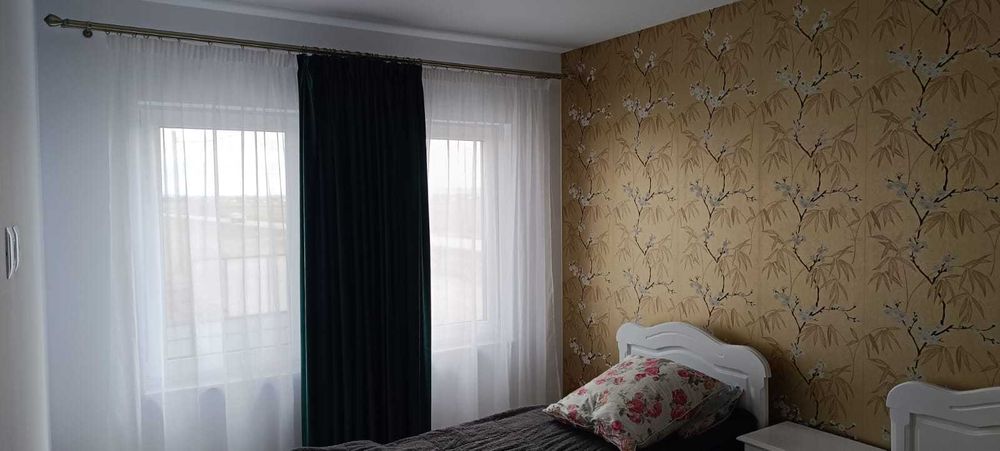 2 Apartamente la casa