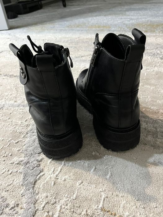 Продам кожаные сапоги.