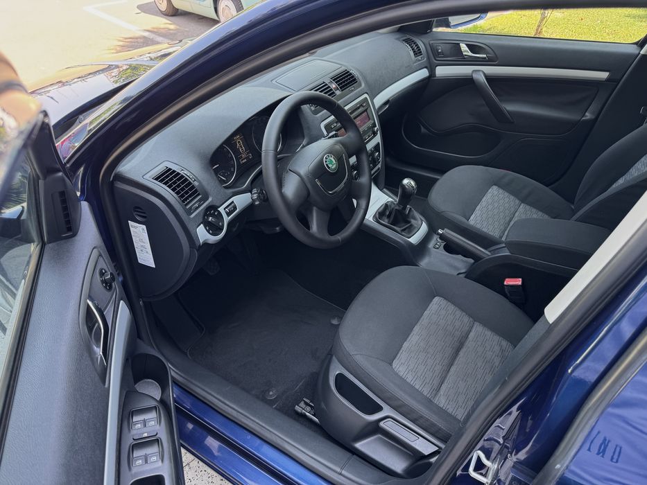Skoda Octavia //2.0tdi//facelift//ac//servo//pilot//incalzire in scaune//carte service//