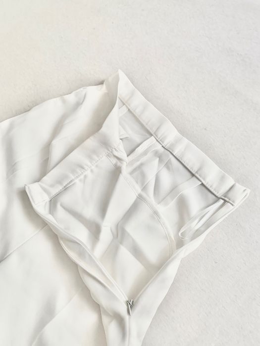 Pantaloni albi talie înaltă