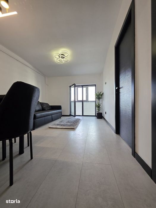 Apartament bloc nou,parcare proprie, mobilat.