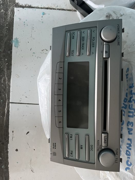 Оригинальный мафон на Камри 40.