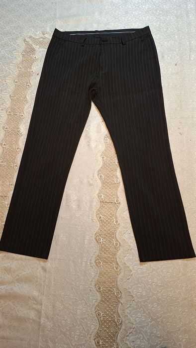 Продам мужской брюки новый