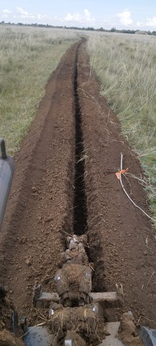 Услуги траншеекопател