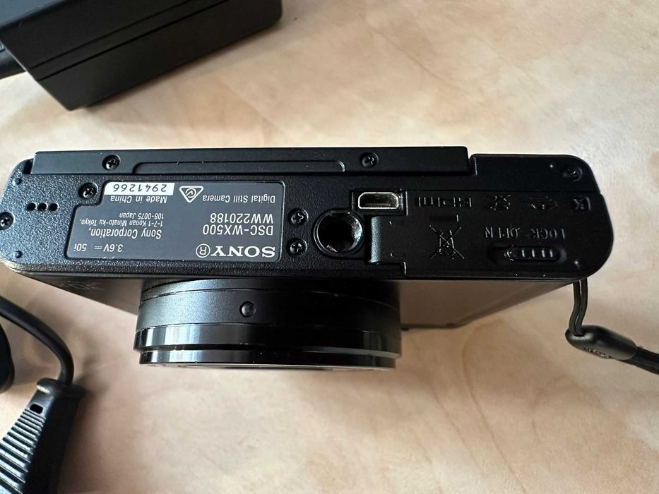 sony dsc-wx500 de culoare negru mat fata spate lateral unghi deschis
