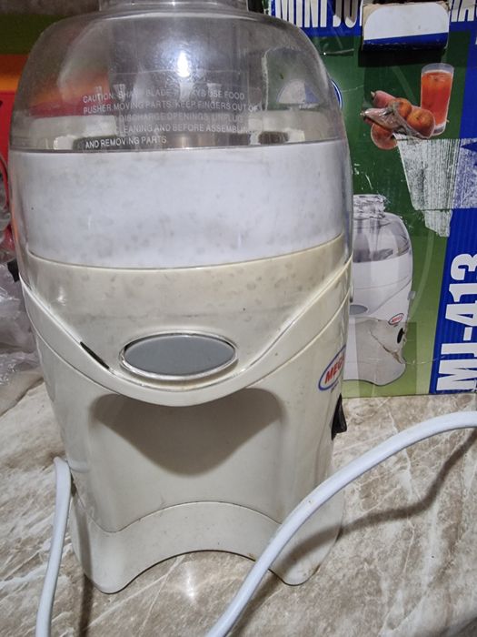 Соковыжималка электрическая