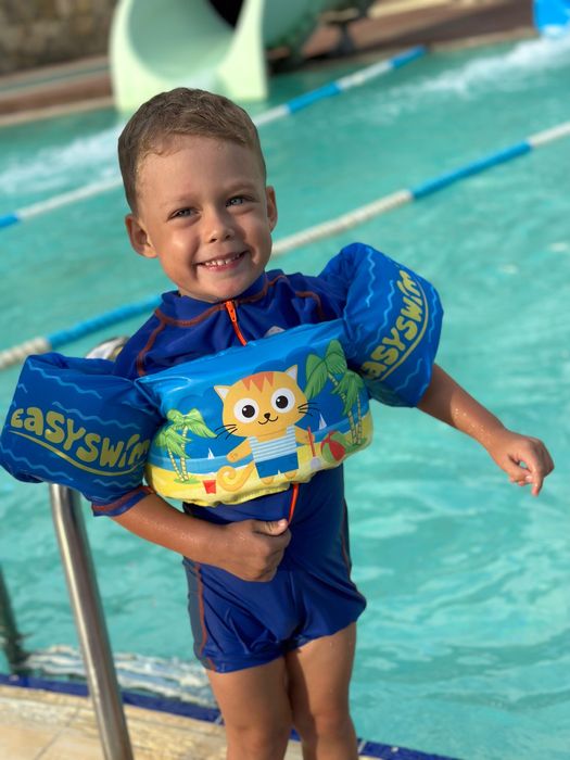 Нарукавники и надувная лодка