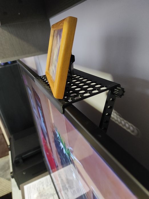 Поставка за върху телевизор