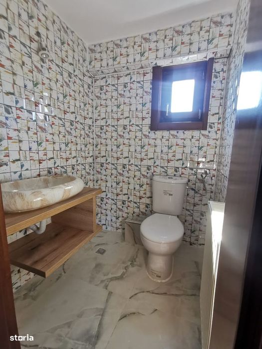 Apartament spatios 136 mp utili cu garaj ,terasă , balcon si boxa.