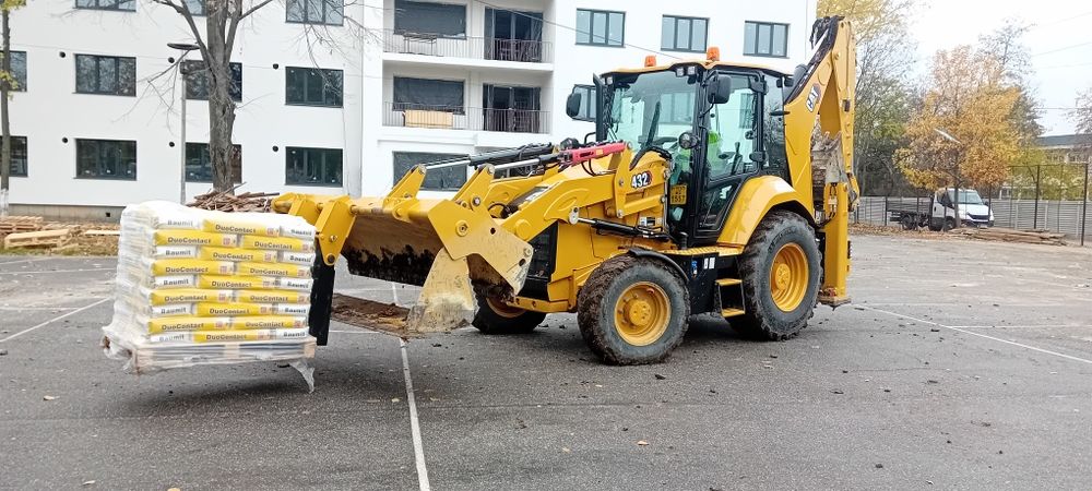 Buldoexcavator caterpillar