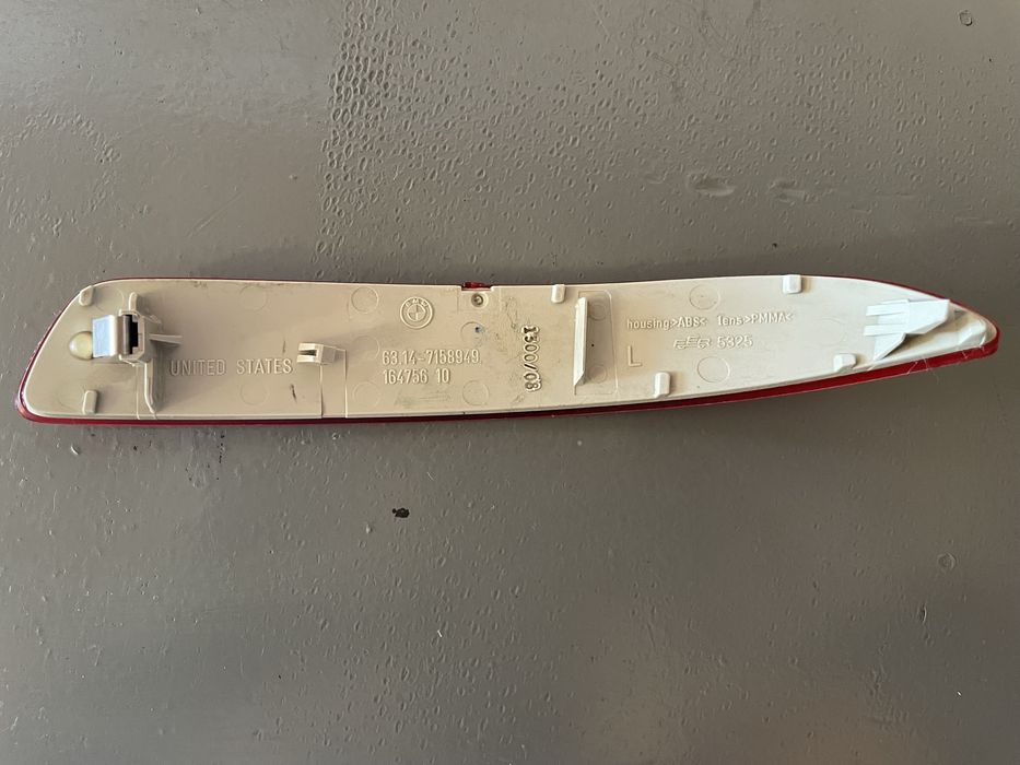 Отражатель заднего бампера е70 дорестайлинг, левая