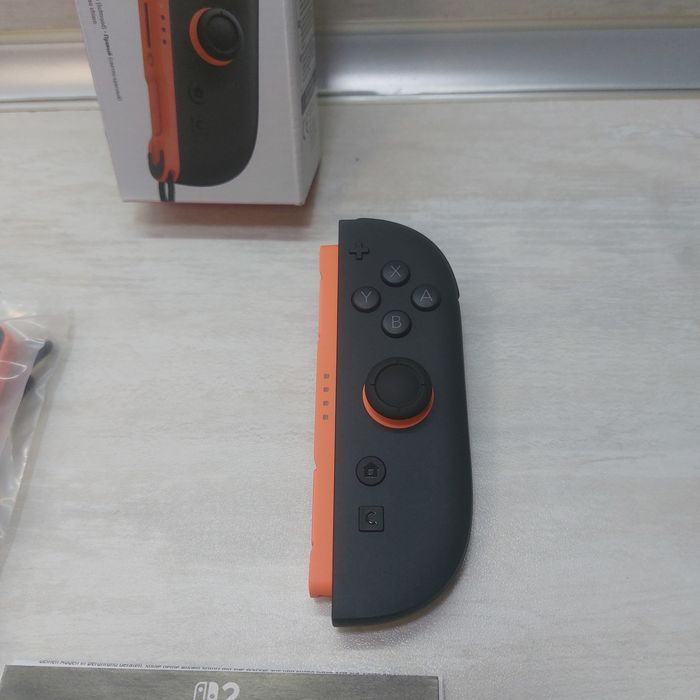 Оригинален Десен Контролер Joy-Con 2 за Nintendo Switch 2 (Light Red) • Пълен комплект с кутия
