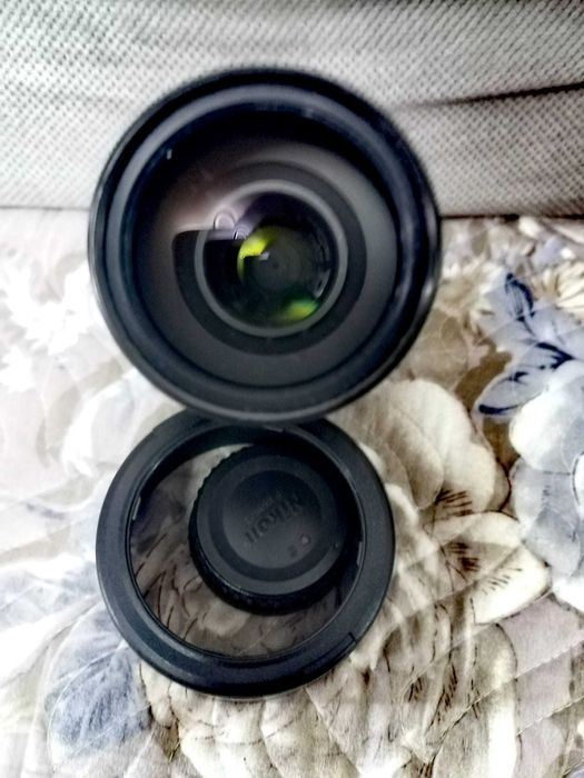 Vând obiectiv Nikkor AF-S 55-300 mm, f/4.5-5.6 G DX cu ED și VR utilizat, în stare bună.