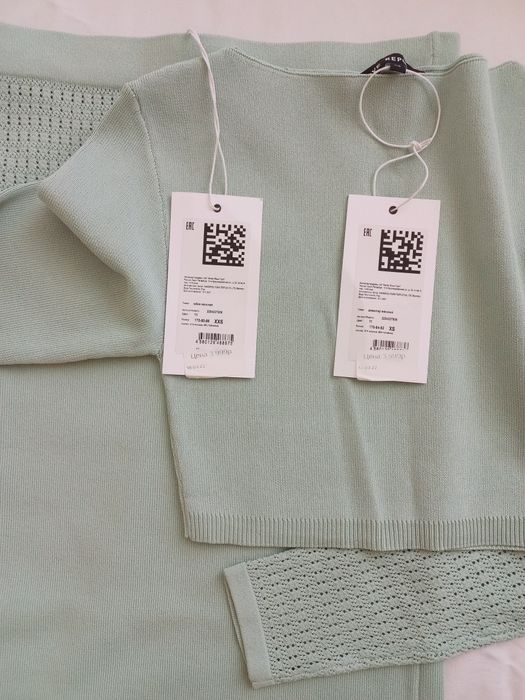 Янги кийилмаган кийим.