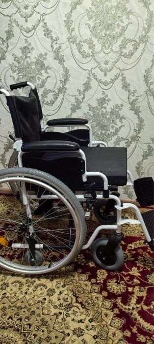 Инвалидная коляска