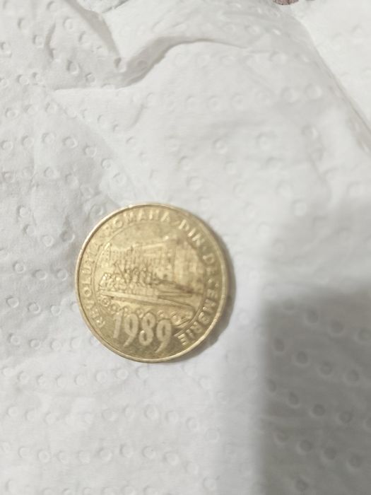Vând moneda de 50 de bani din revoluția 1989