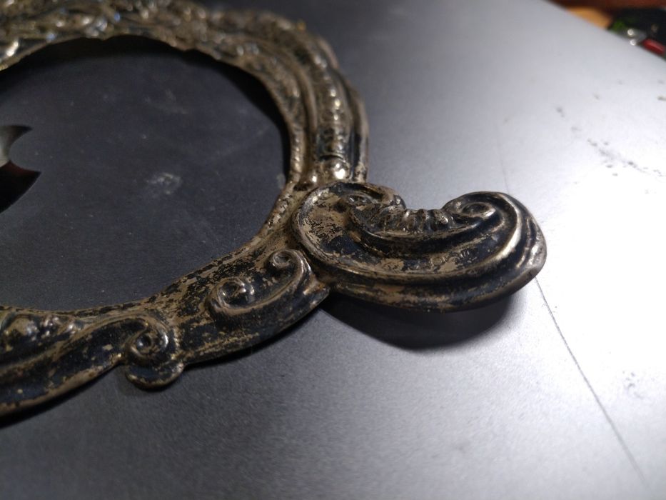 Стара сребърна рамкка за снимки