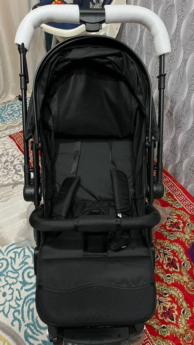 Новый коляска колданылмаган