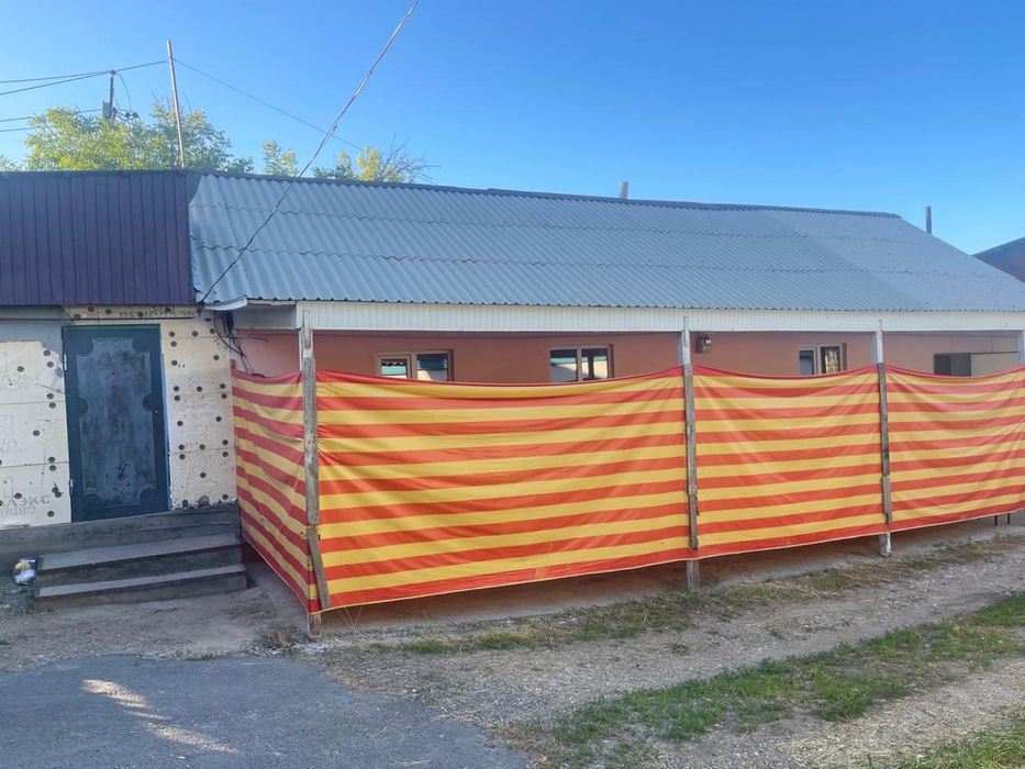 Жилой дом с магазином