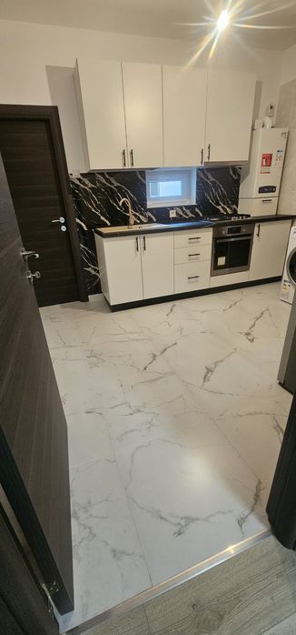 Închiriez apartament Nou la Casă (parter)600€  telefon 0723380602