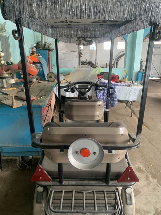 Электрический трицикл