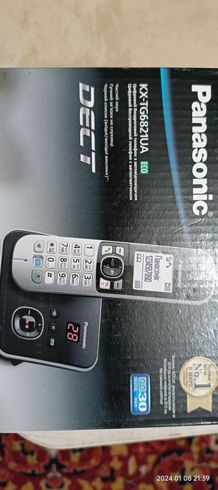 Цифровой беспроводной телефон Panasonic с автоответчиком.