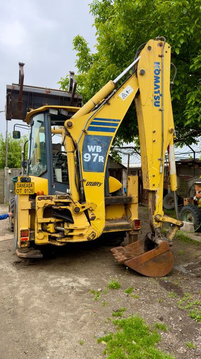 Vând buldoexcavator Komatsu 97