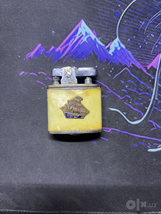 Продается японская зажигалка omega