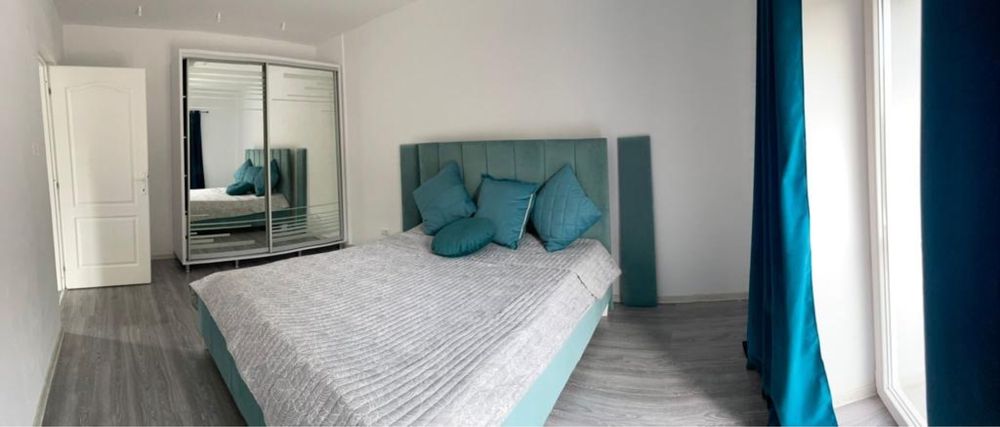 Apartament cu 3 camere decomandate, luminos, cu curte, centrala proprie si aer conditionat, la 15 min de UVVG