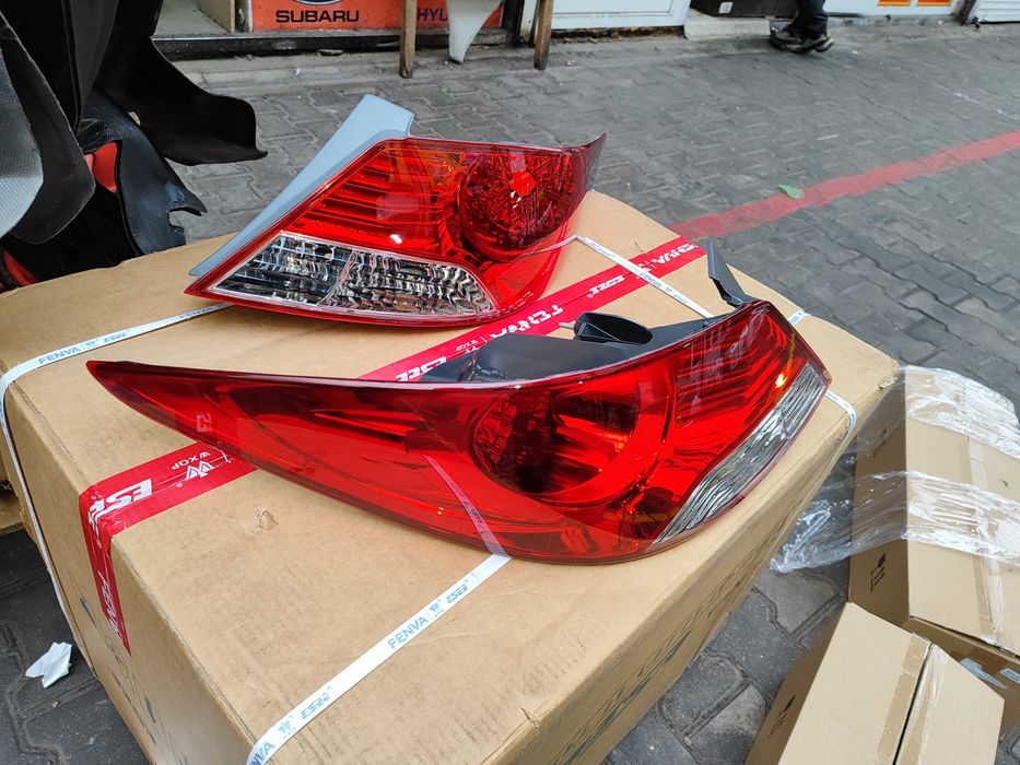 Акцент задний фонарь