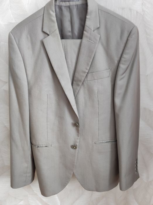 Мужские костюмы .