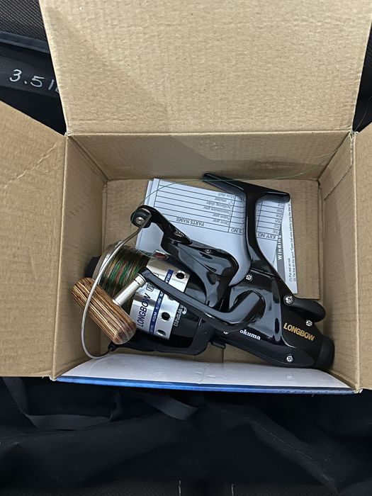 Okuma custom black + longbow