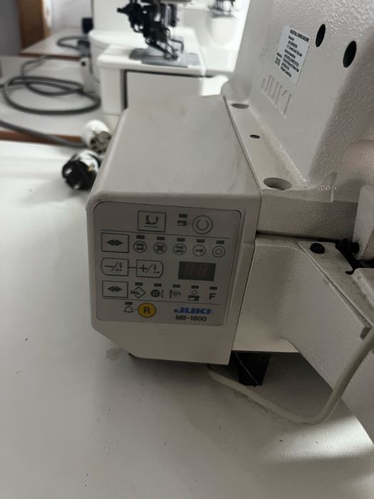 JUKI MB-1800B – Mașină de cusut industrială automată pentru cusut nasturi