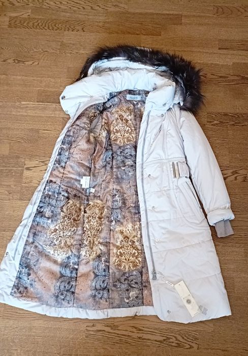 Продам пуховик женский