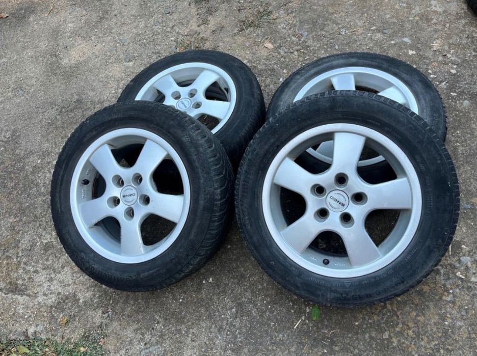 Продавам 2 комплекта алуминиеви джанти + гуми за Opel