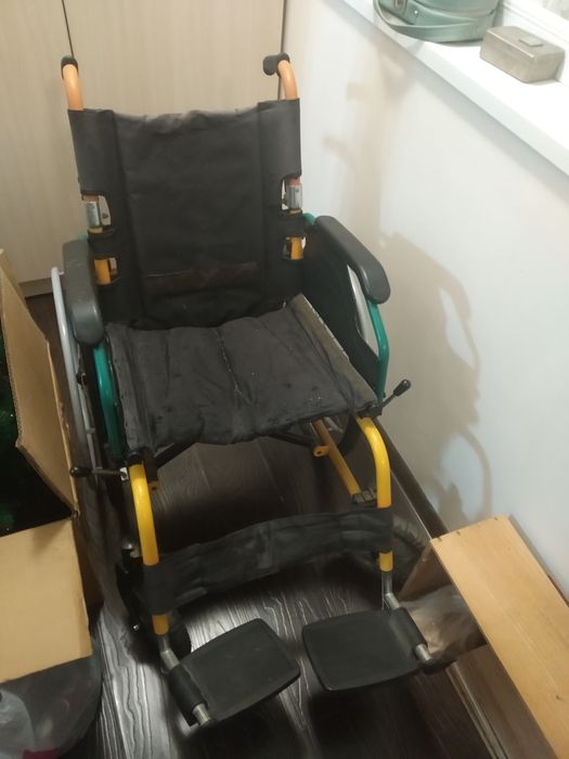 Инвалидная коляска